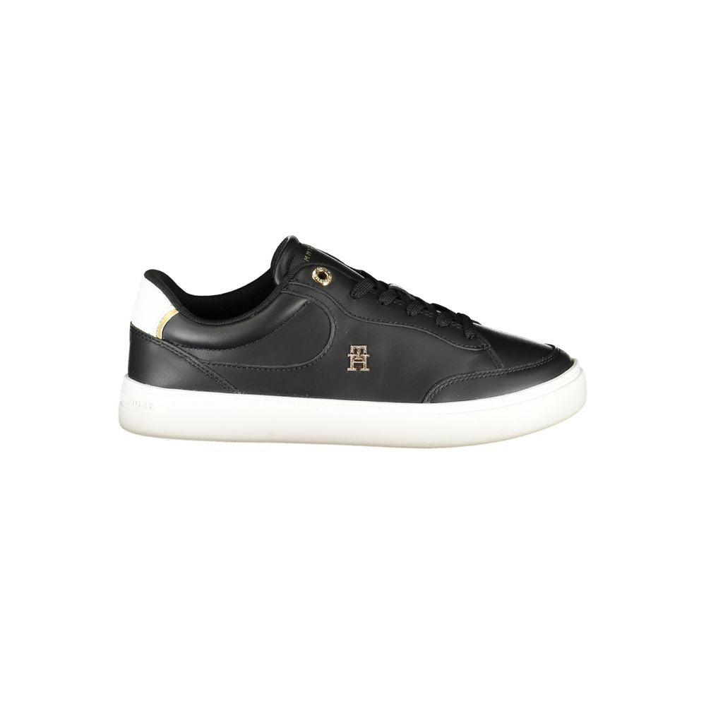 Dark gray sneaker with white sole on a white background