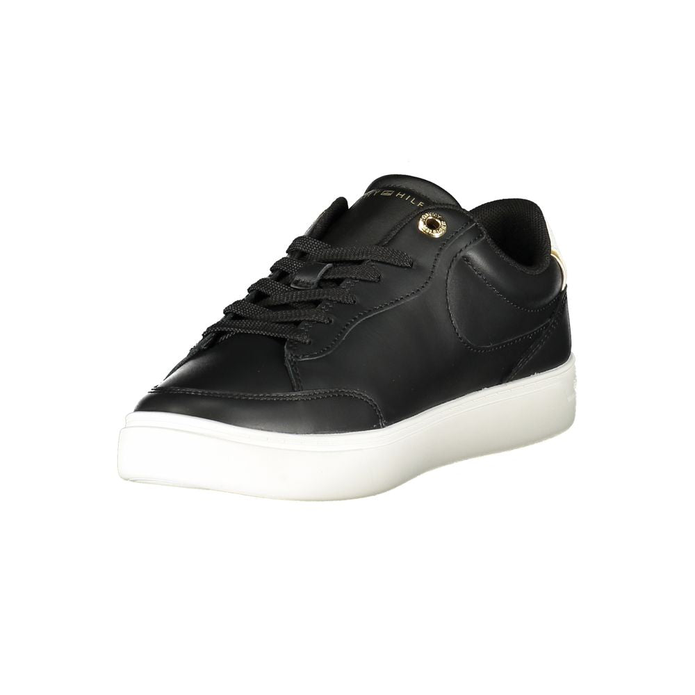 Black sneaker with white sole on a white background