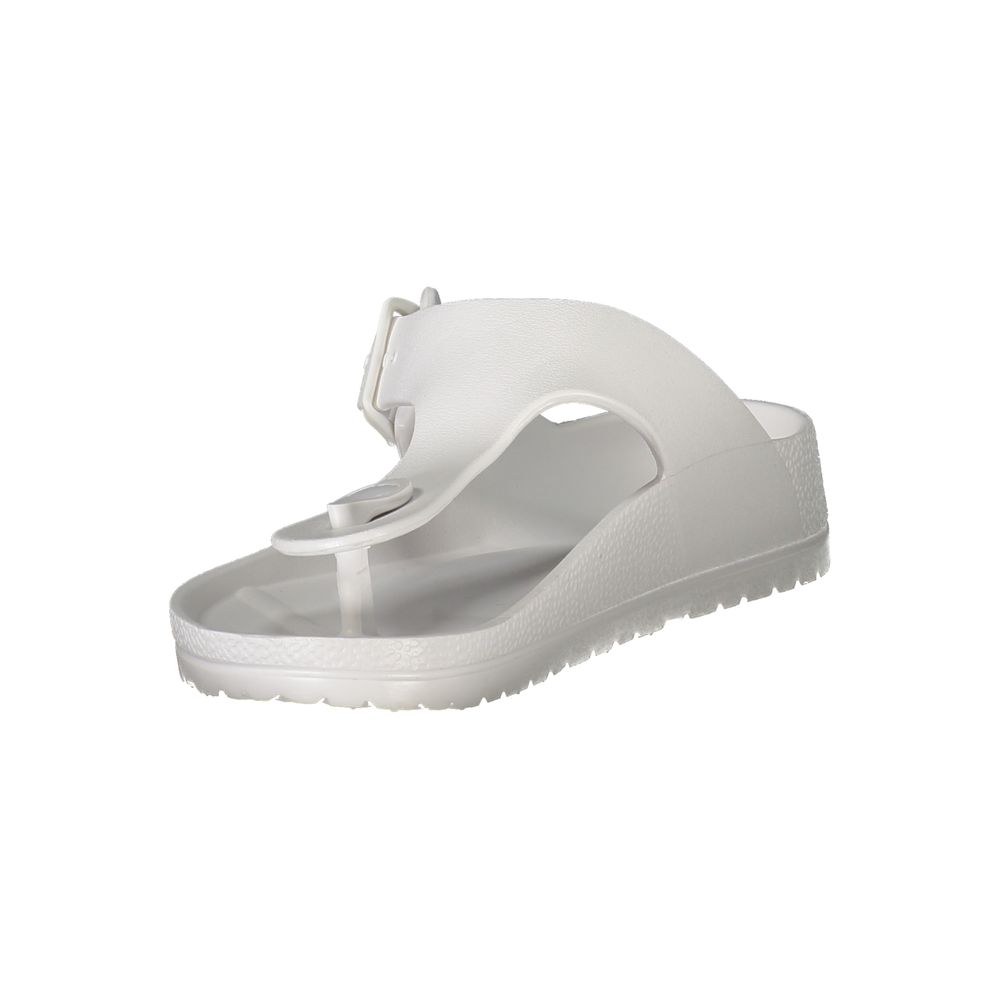 Women's Norway 1963 white plastic thong sandal with a side buckle strap on a contoured footbed.