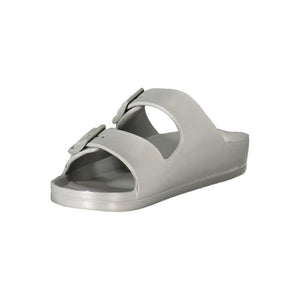 Norway 1963 gray plastic two-strap slide sandal for women.