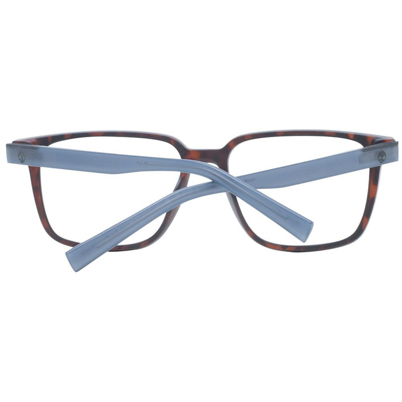 Brown tortoiseshell plastic eyeglass frames with wide grey temples folded inward