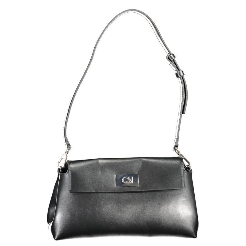 Black polyurethane Calvin Klein women's shoulder bag with flap closure and silver CK logo plaque