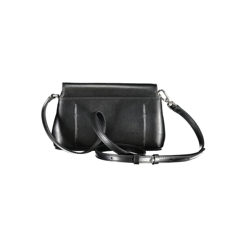 Black polyester Calvin Klein crossbody handbag with a flap closure and adjustable shoulder strap