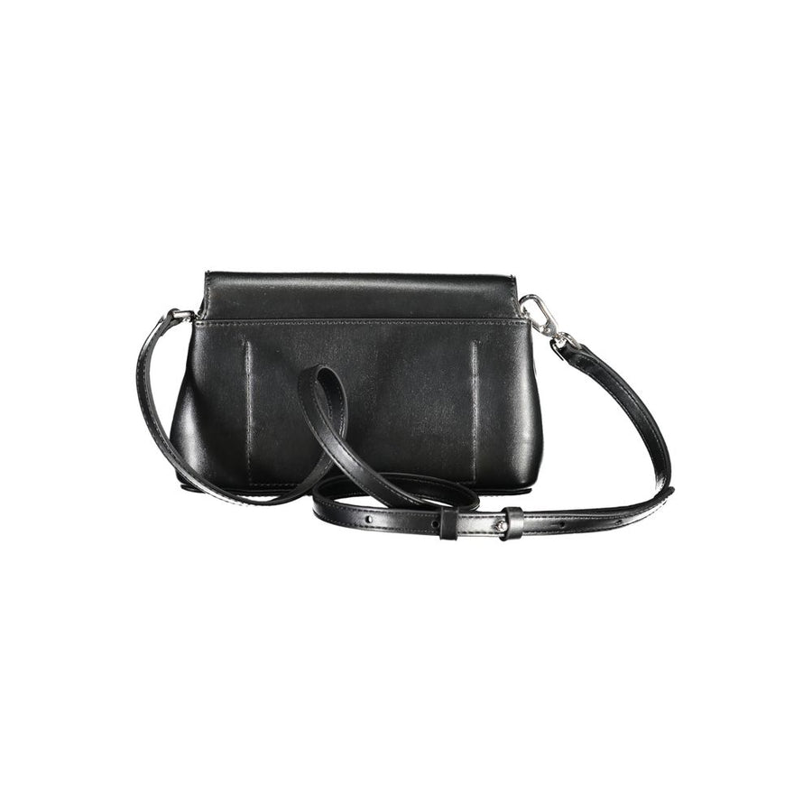 Black polyester Calvin Klein shoulder handbag with flap closure and silver CK logo plaque