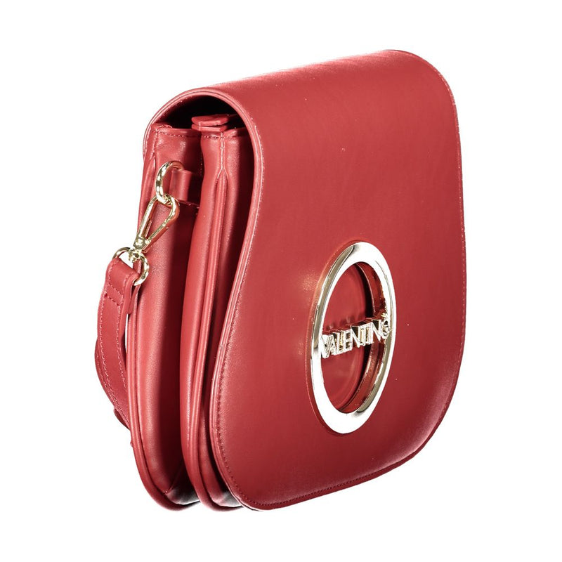 Red polyurethane women's crossbody bag with a round gold metallic logo on the front flap