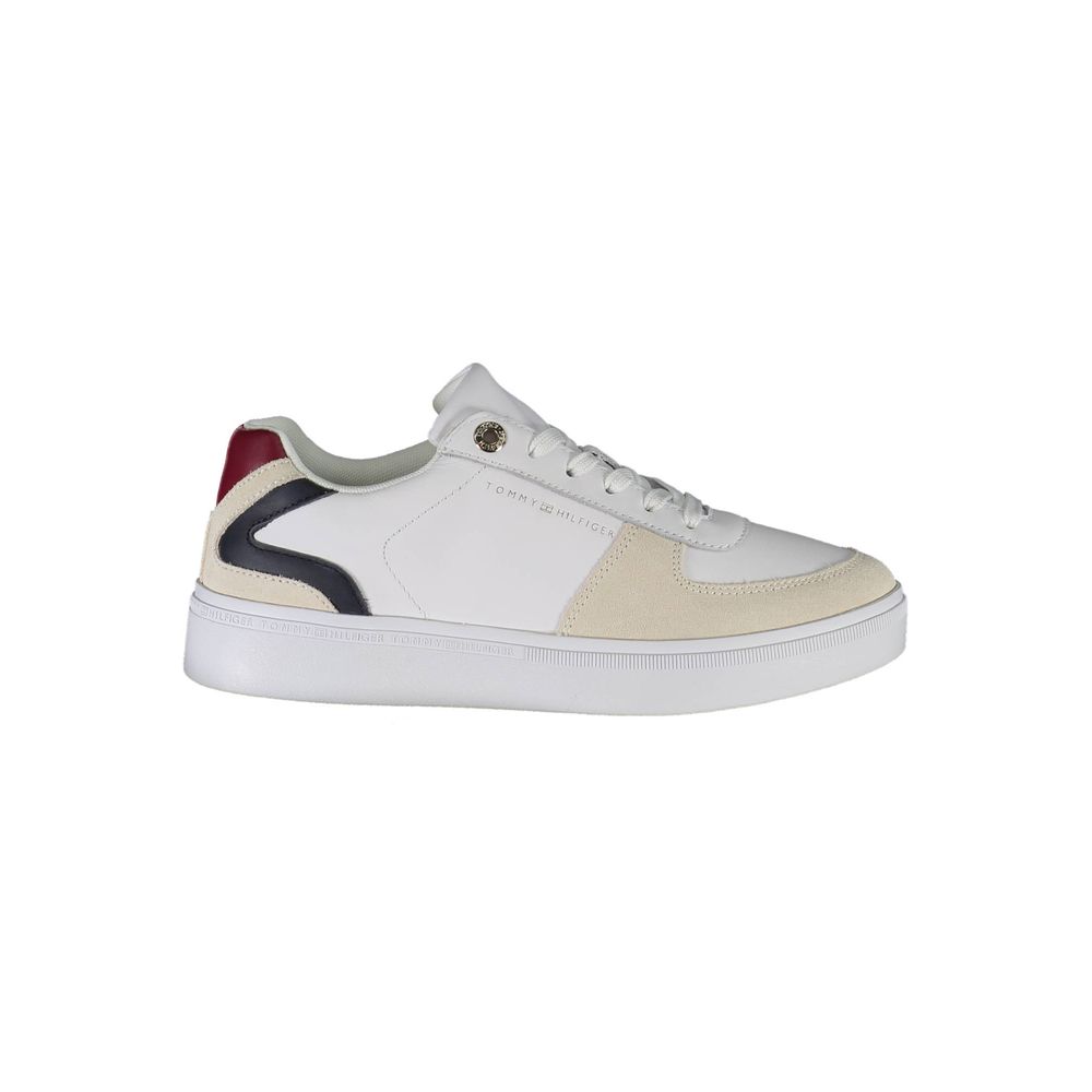 Tommy Hilfiger white polyester low-top sneaker with beige suede panels, navy curved detail, and maroon heel tab.