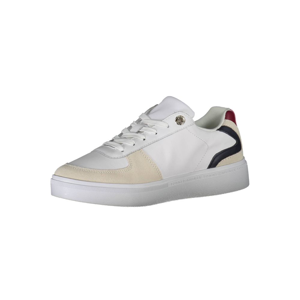 Tommy Hilfiger white polyester women's sneaker with beige suede-like accents, navy trim, and a thick white sole.