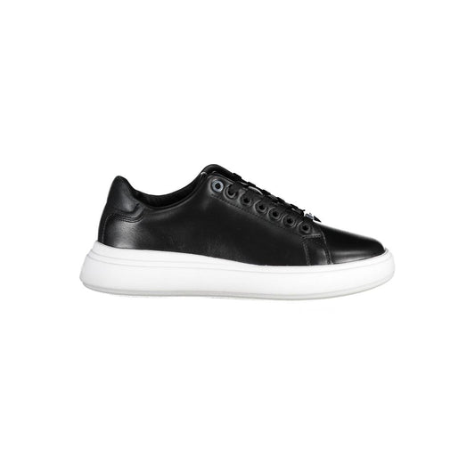 Calvin Klein women’s black leather low-top sneaker with a thick white rubber sole and tonal eyelets.