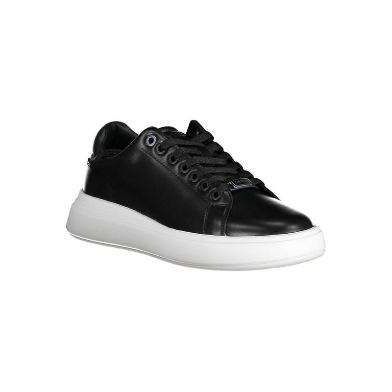 Calvin Klein black leather women's sneaker with lace-up front, metallic branding, and a thick white platform sole.