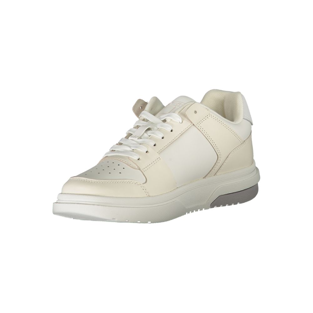 Women's Tommy Hilfiger white leather lace-up sneaker with a chunky, modern athletic silhouette.