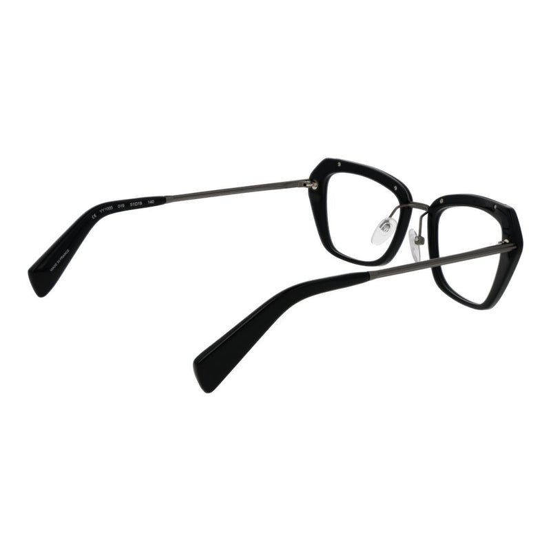 Black plastic and metal eyeglasses frames with geometric rims on a white background