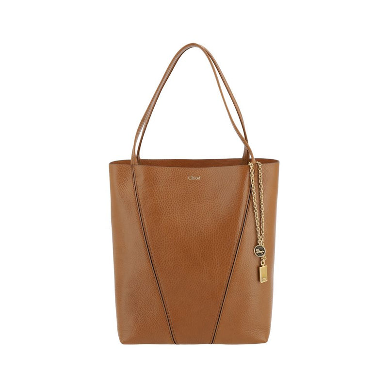 Brown leather Chloé shoulder bag with dual straps and hanging gold chain charm