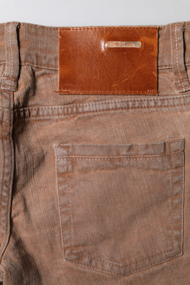 Brown cotton slim fit denim low waist jeans with back pocket and leather brand patch