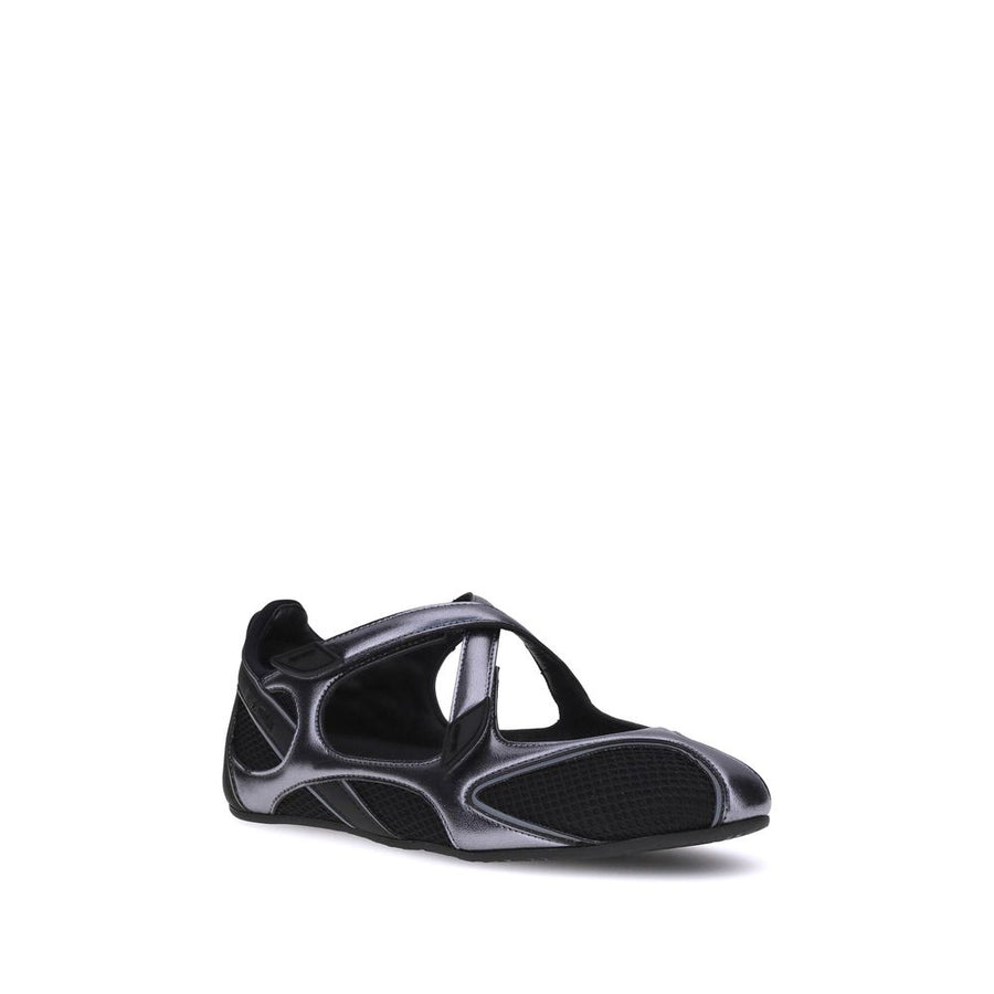 Side view of a metallic silver and black mesh Mary Jane sneaker with crisscross straps.