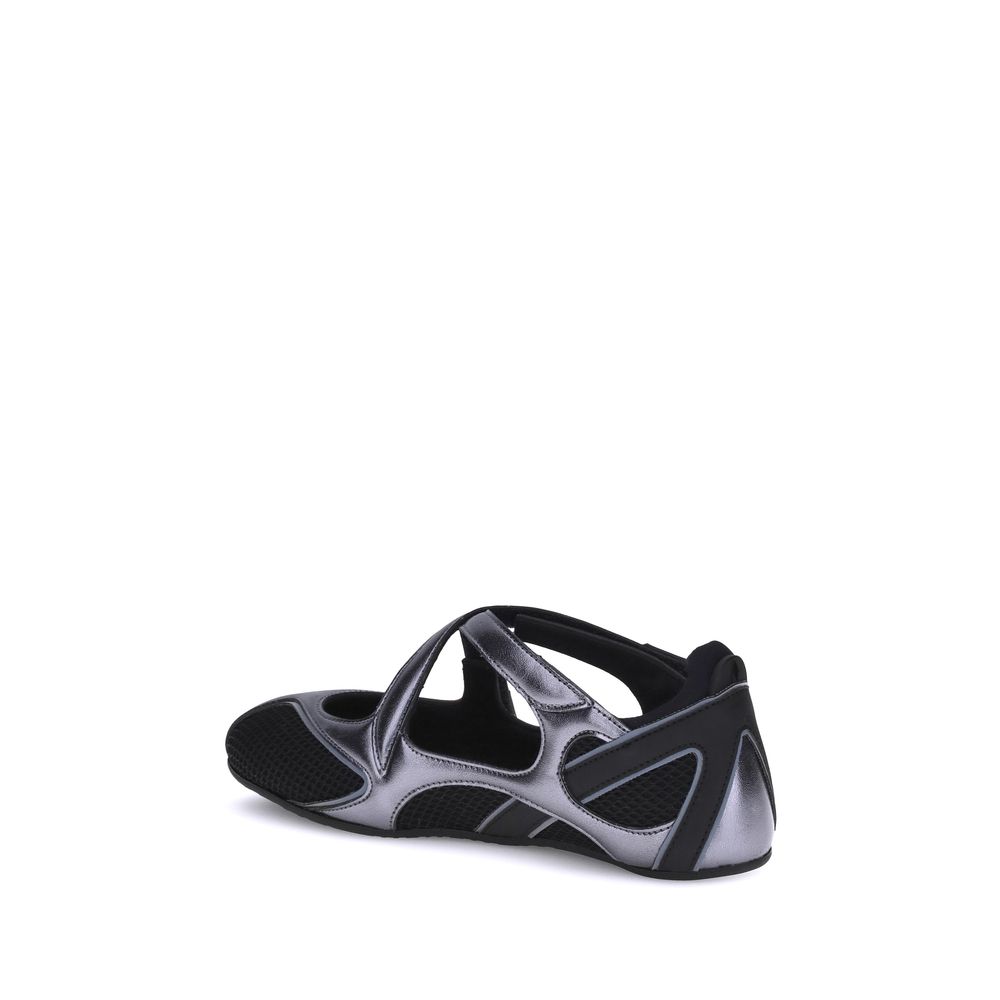 Metallic silver and black athletic ballet flat with cutout design, mesh panels, and crisscross straps.