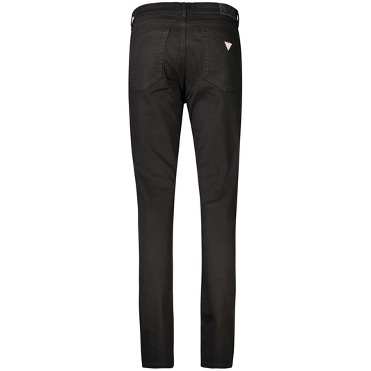 Black cotton women's skinny jeans viewed from the back