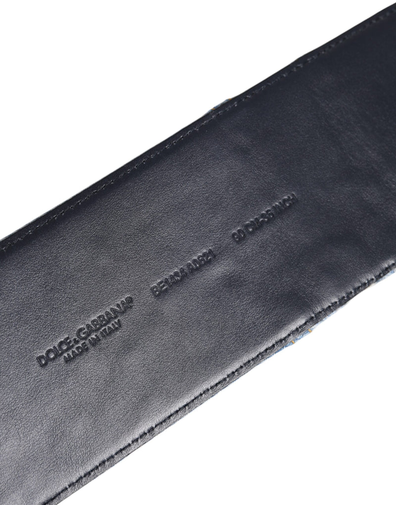 Black leather inner side of a Dolce & Gabbana denim belt with brand and size stampings