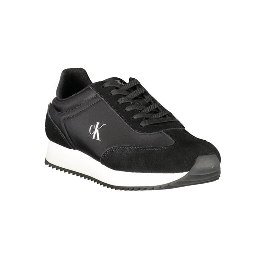 Calvin Klein black leather and suede women’s sneaker with white midsole and side CK logo.