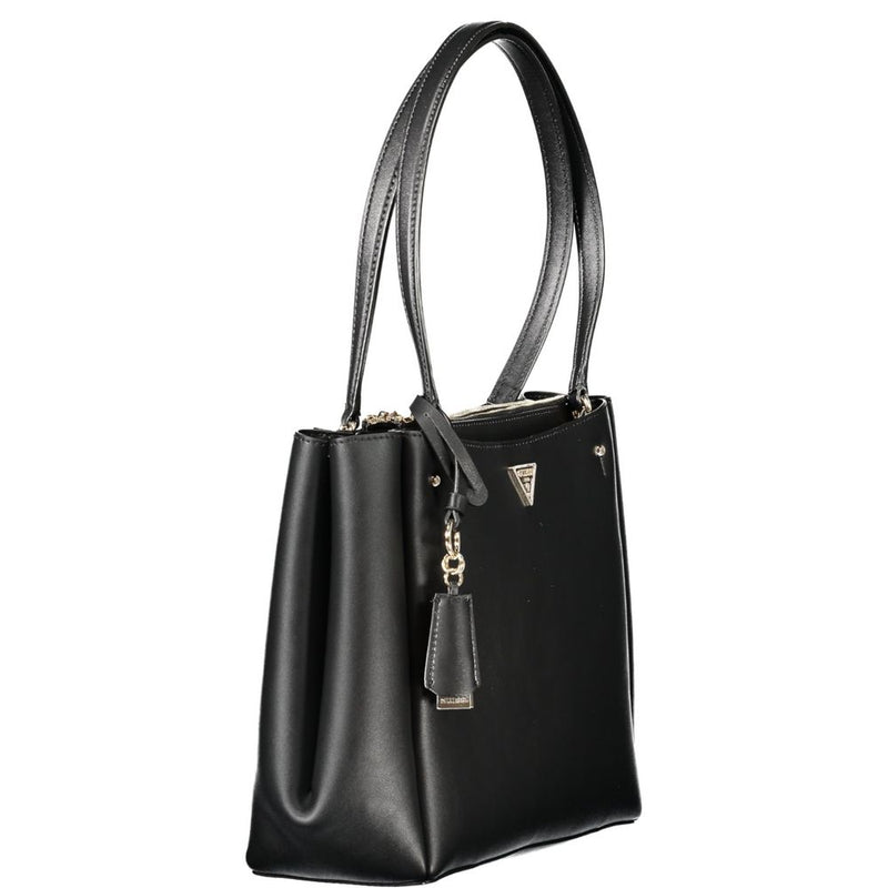 Black polyurethane women's tote handbag with dual shoulder straps and a dangling charm