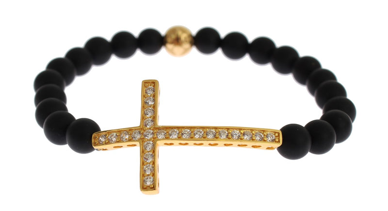 Beaded stretch bracelet featuring black matte onyx stones and a gold-plated cubic zirconia cross pendant