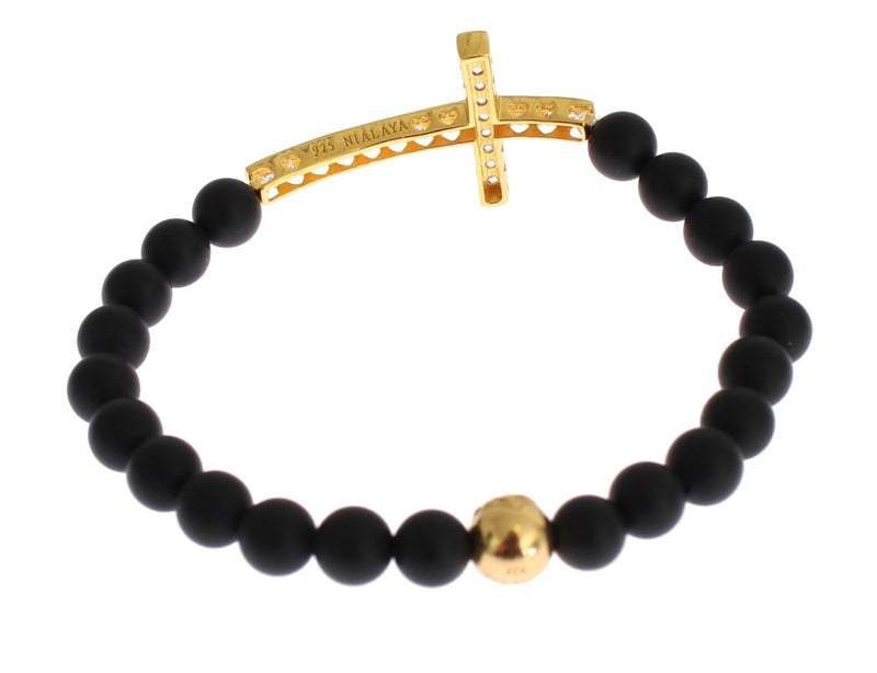 Matte black onyx beaded bracelet with a gold-plated silver cross charm and a single gold bead