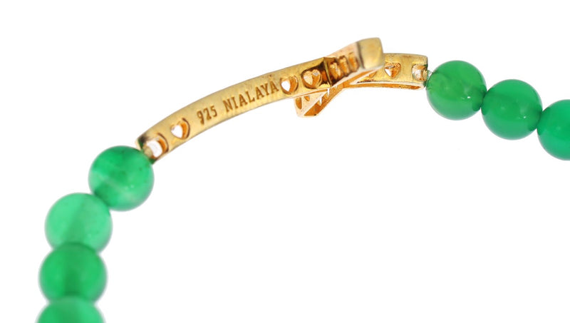 Green jade bead bracelet featuring a gold CZ cross charm with brand and silver purity hallmarks