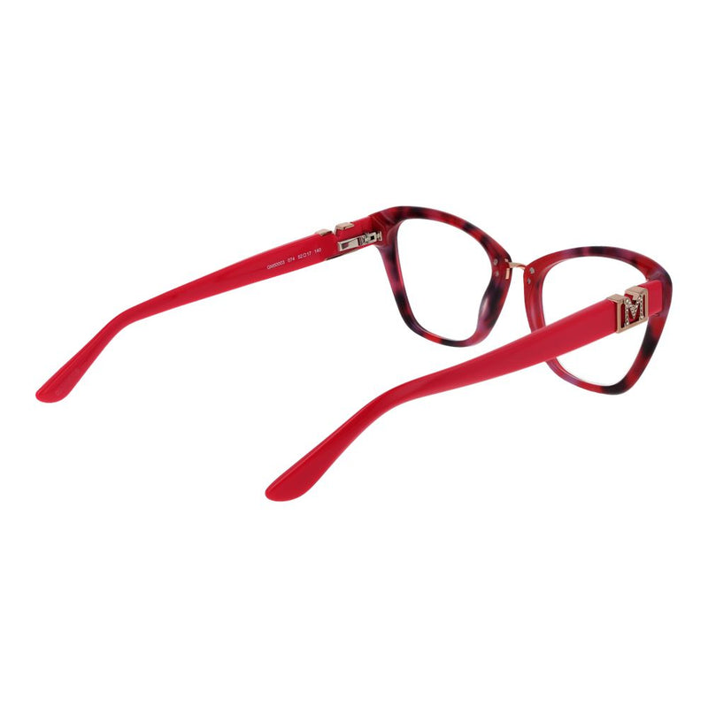 Red and tortoiseshell acetate cat-eye eyeglass frames with red temples and gold M logo on the hinge