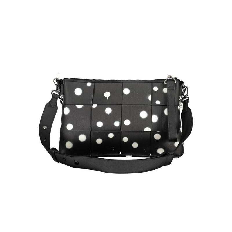 Black polyurethane crossbody bag with white polka dot pattern and thick shoulder strap