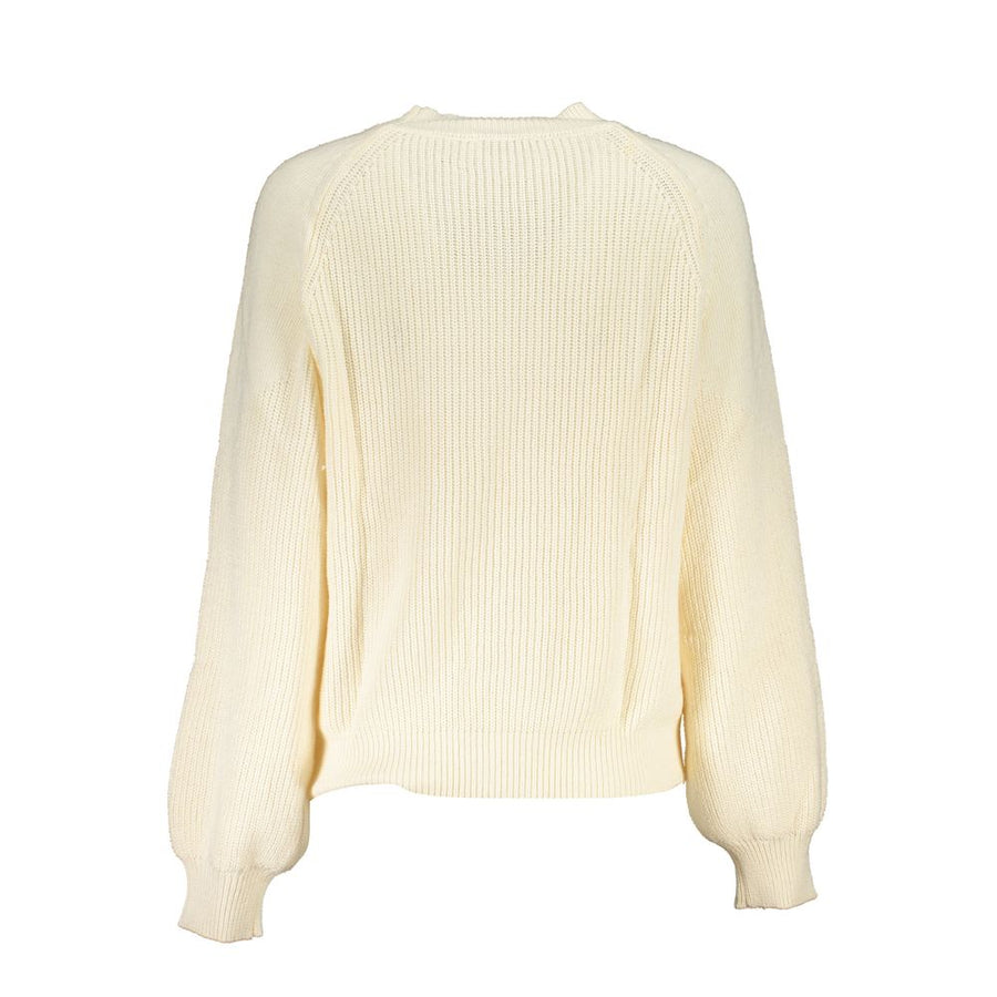 White ribbed knit women's sweater with long sleeves and a crew neck