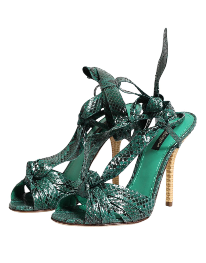 Dolce & Gabbana green python-embossed leather lace-up heels with open toes and textured stiletto heels.