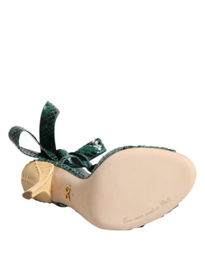 Dolce & Gabbana green python leather heeled sandals with an ankle ribbon tie and textured cream stiletto heel.