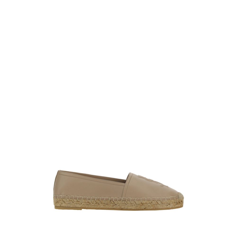 Beige lambskin slip-on espadrilles by Saint Laurent with a braided jute midsole and tonal embossed logo.