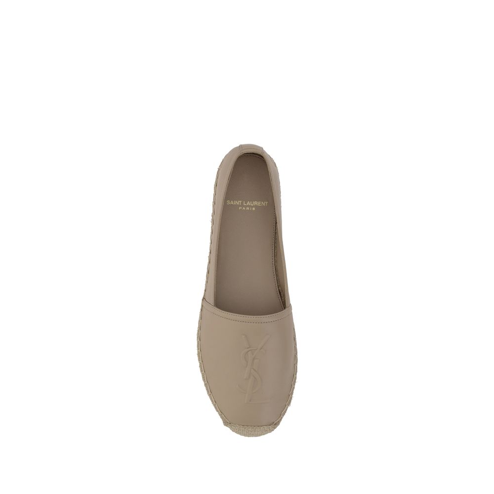 Beige Saint Laurent espadrille in smooth lamb leather with embossed YSL logo and a braided jute sole.