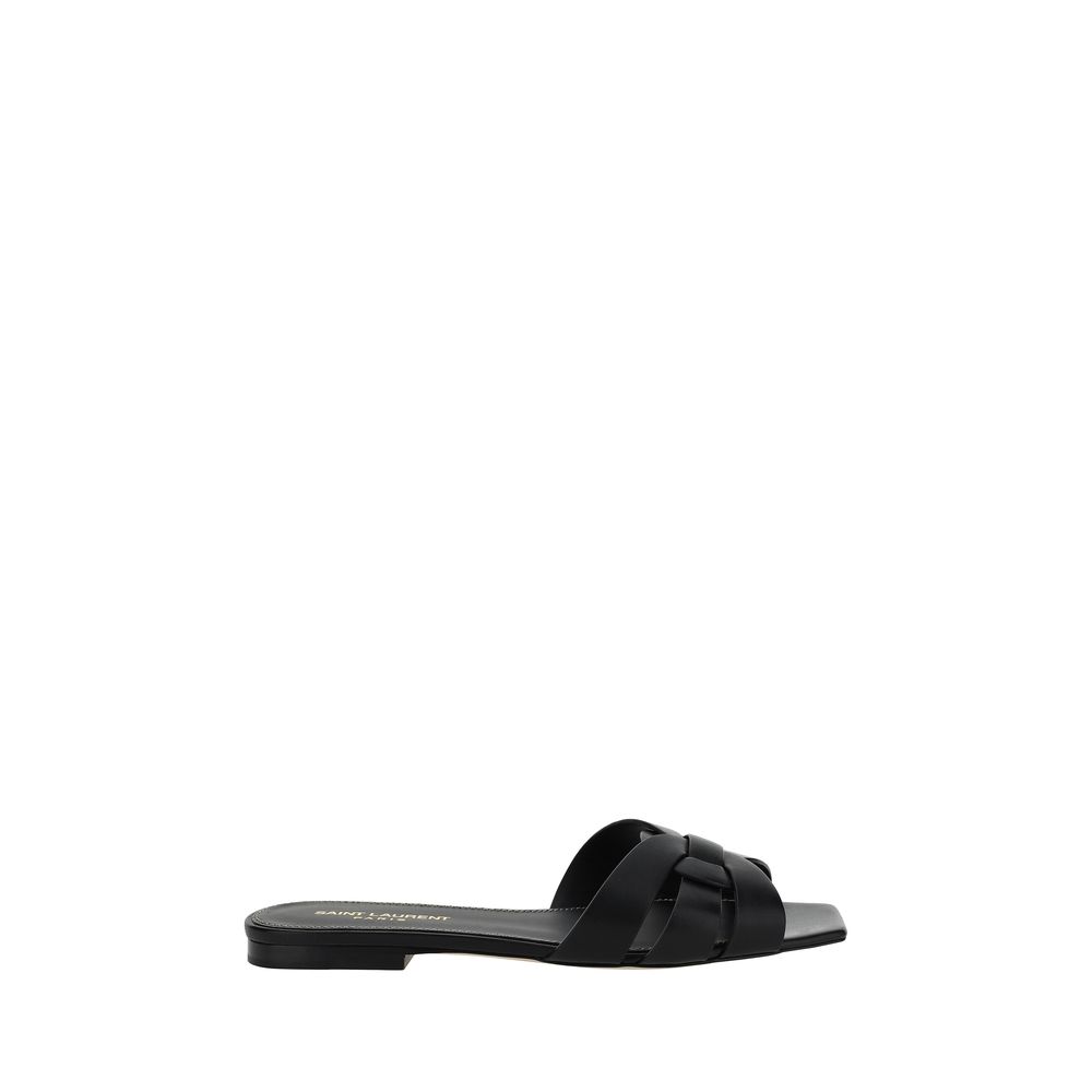 Black sandal with a bow on a white background