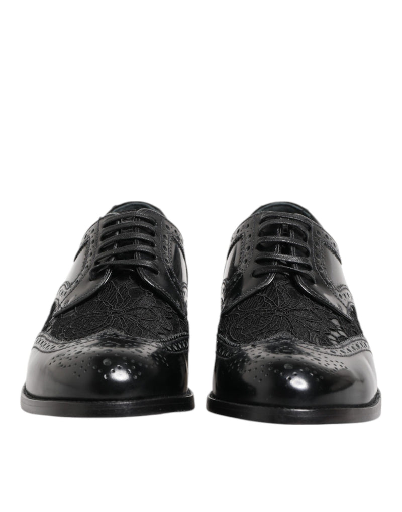 Black leather and floral lace formal brogues by Dolce & Gabbana with classic wingtip detailing and black laces.