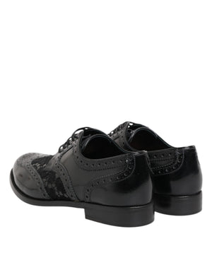 Black leather and lace brogue formal shoes by Dolce & Gabbana with wingtip detailing and a low block heel.