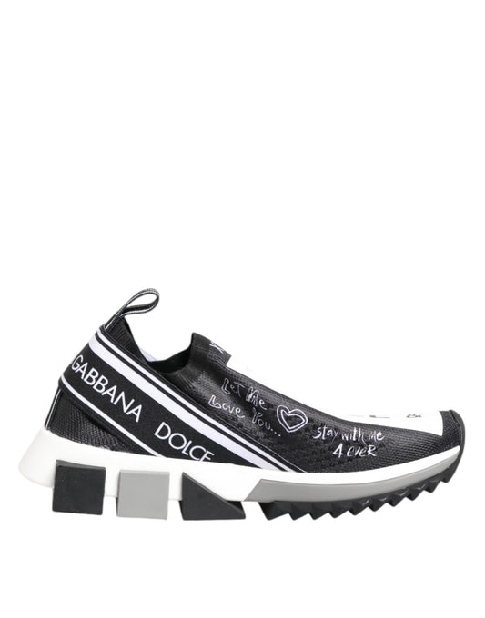 Black and white Dolce & Gabbana Sorrento knit slip-on sneakers with graffiti text and chunky geometric rubber sole.