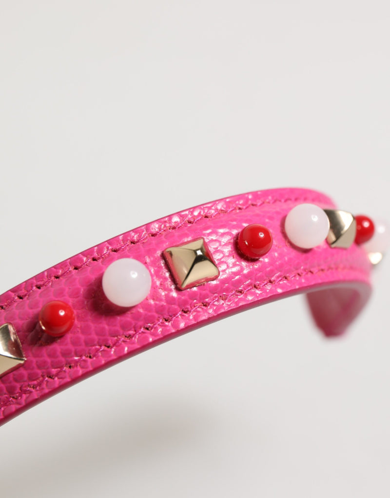 Pink textured leather shoulder strap with gold studs and round white and red bead embellishments