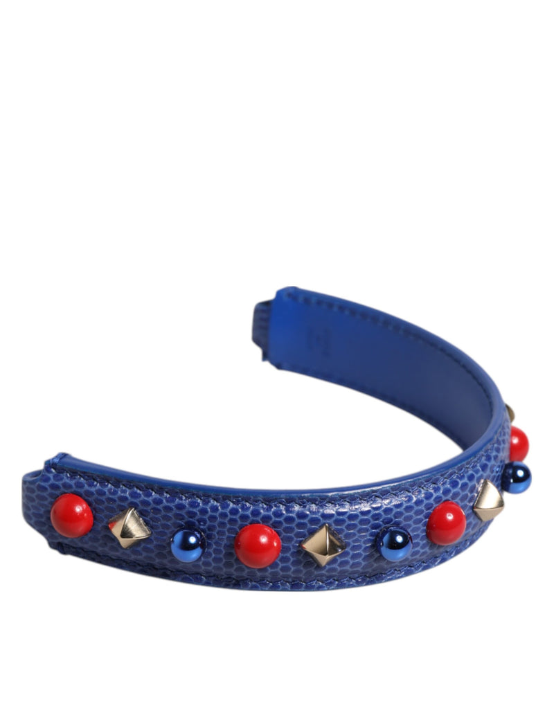 Blue textured leather shoulder strap embellished with red beads and metallic studs