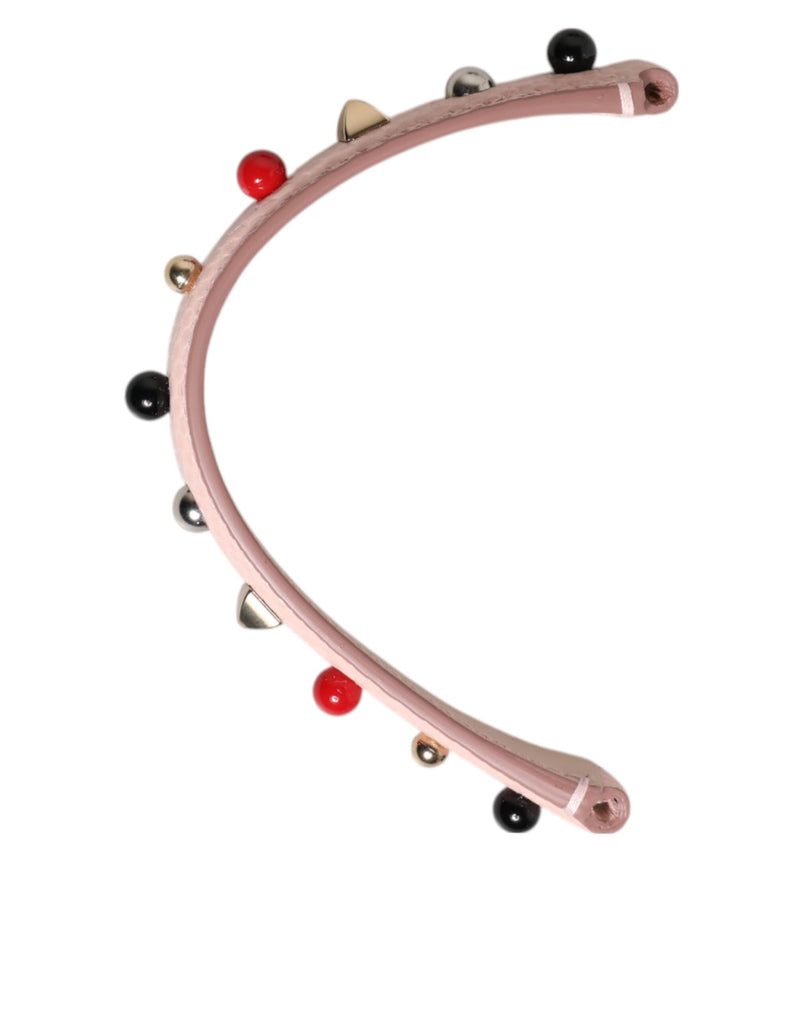Light pink leather bag handle embellished with colorful beads and studs