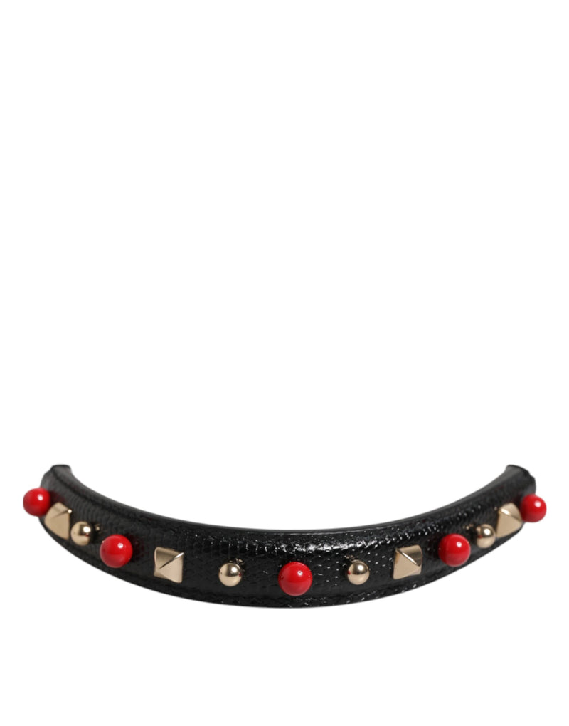 Black leather bag handle with red beads and gold studs