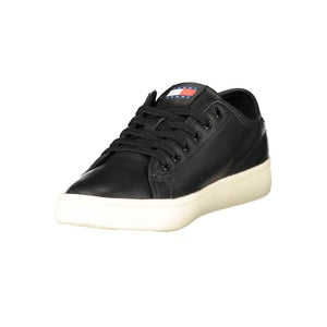 Tommy Hilfiger women's black polyurethane sneaker with lace-up closure and a white rubber sole.