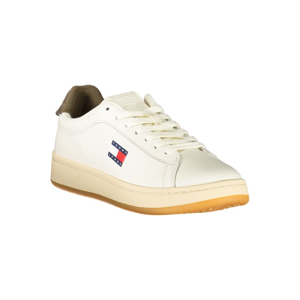 White polyurethane women's sneaker with lace-up closure, Tommy Jeans flag logo, and olive green heel detail.