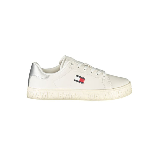 White Tommy Hilfiger polyurethane low-top sneaker with silver heel detail and logo branding on the side.