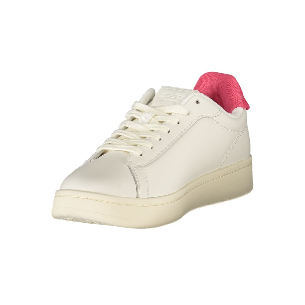 White polyurethane women’s sneaker with a lace-up front, cream platform sole, and a vibrant pink fabric heel tab.