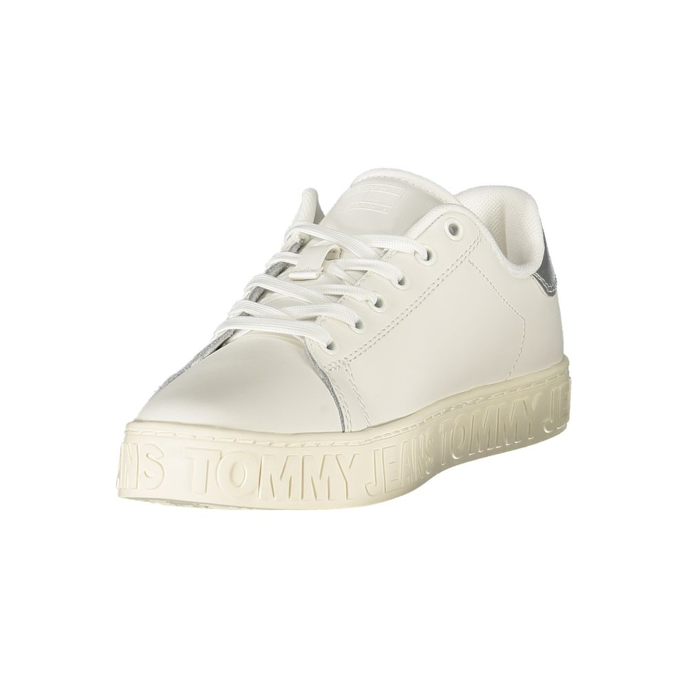 White polyurethane women’s sneaker with lace-up closure and embossed Tommy Jeans branding on the thick rubber sole.