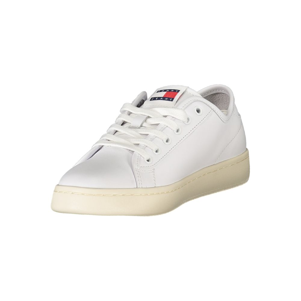 Tommy Hilfiger white polyurethane low-top women's sneaker with lace-up closure and a cream-colored rubber sole.