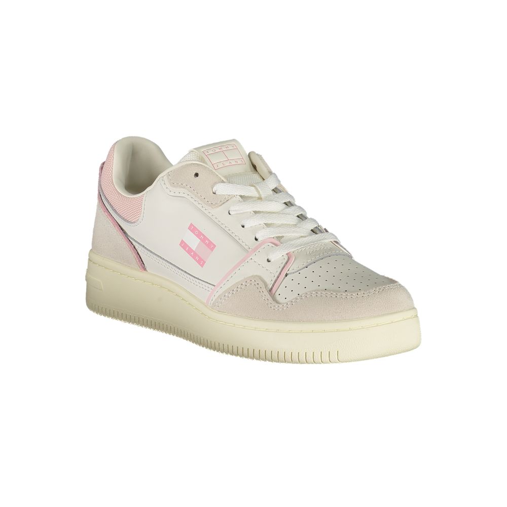 White Tommy Jeans polyurethane sneaker with pink accents, suede overlays, lace-up closure, and flat rubber sole.