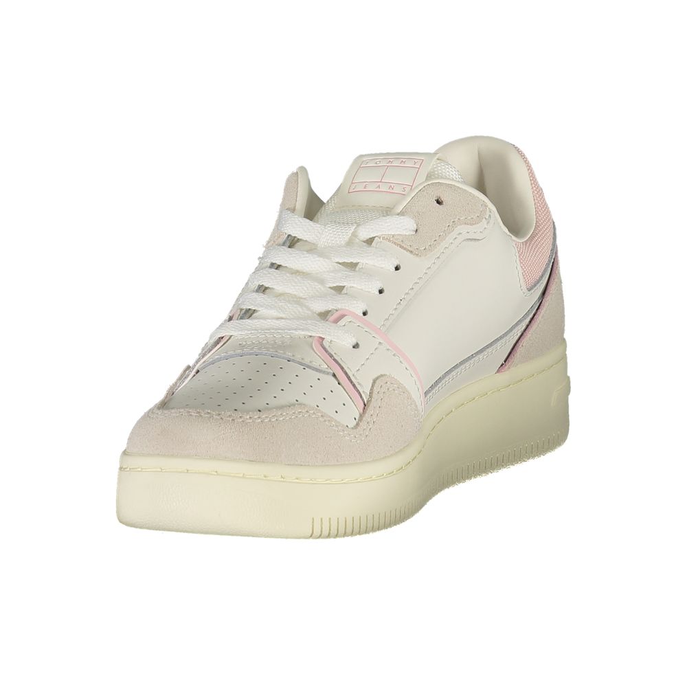 Tommy Hilfiger women's white polyurethane and suede lace-up sneaker with pink accents and a thick rubber sole.