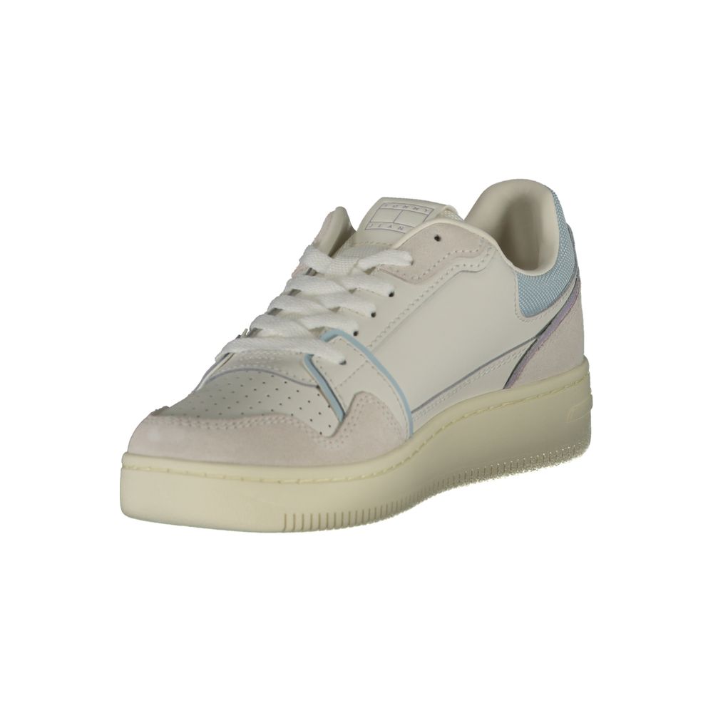 Tommy Hilfiger women’s white polyurethane sneaker with suede accents, lace-up front, and pastel blue heel detail.